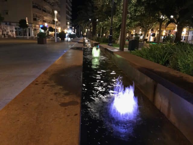 Colored Water Fountain Channel In A Street Park