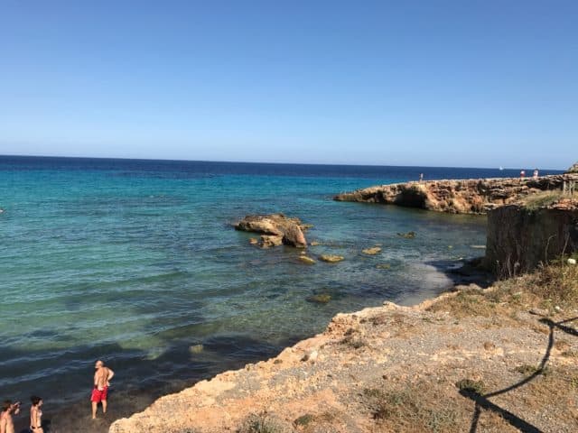 Ocean Rock Swimmers In Cove In Spain
