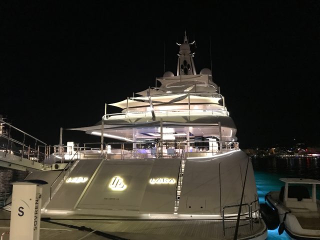 Rear Super Yacht Docked In Harbor In Ibiza