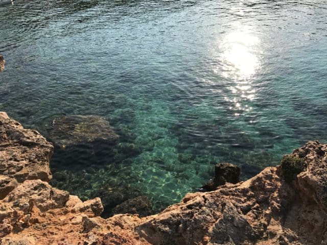 Sunlight Glare In Tropical Water Off The Coast Of Ibiza