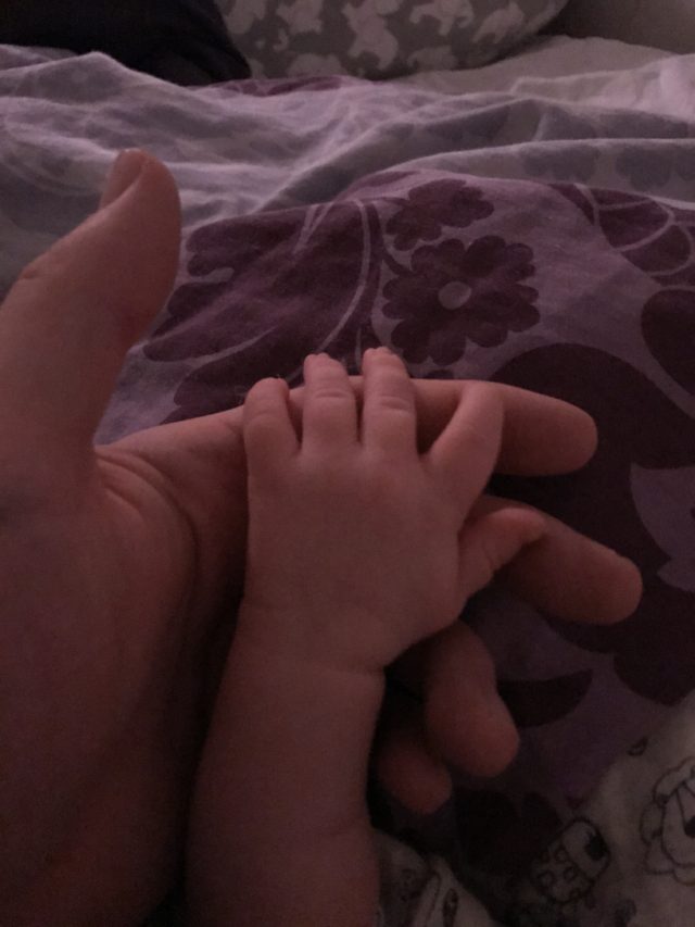 Small Baby Hand In A Father’s Hand