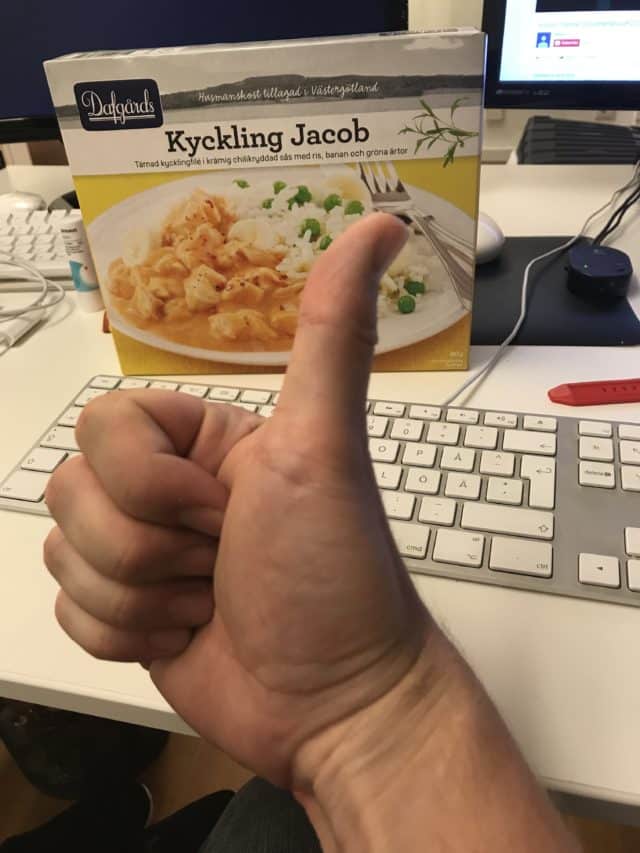 Microwave Food Packaging On An Office Desk With A Thumbs Up