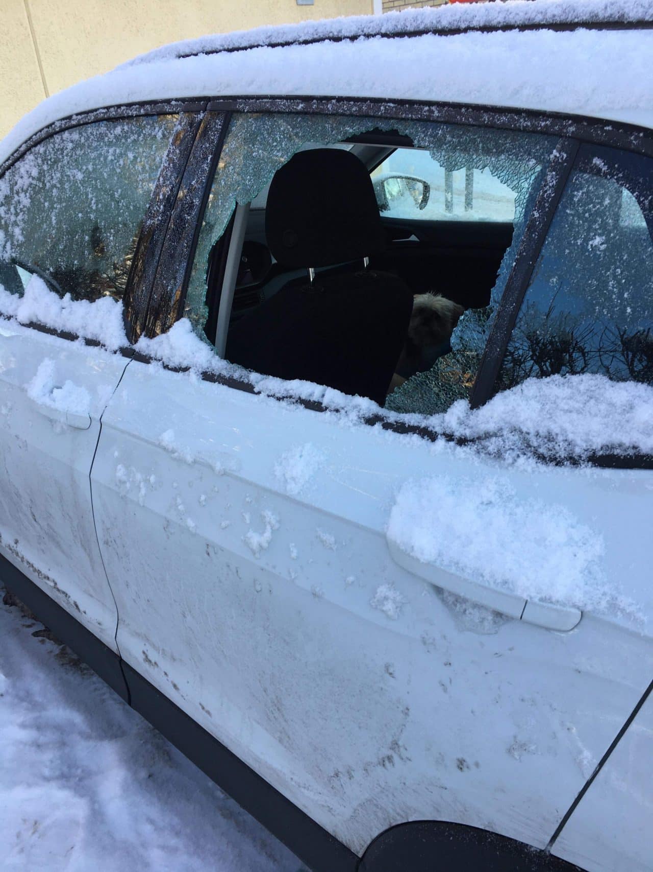 Broken Window On A Car In The Winter