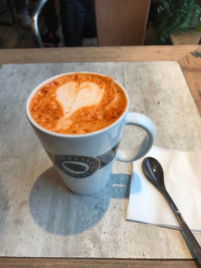 Coffee Latte In A Mug With A Heart In The Foam