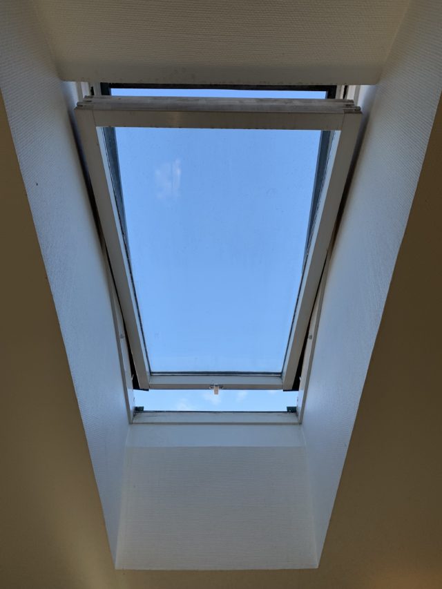 Open Ceiling Skylight Window With A Blue Sky