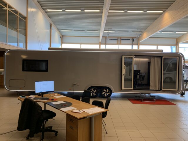Adria Caravan Indoor Dealership With A Desk