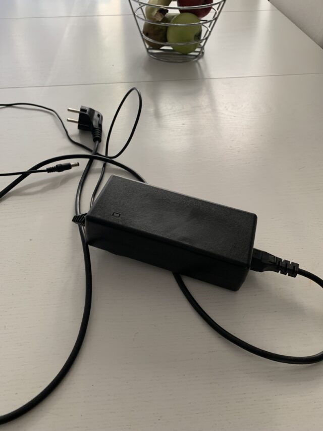 Black Power Cord On White Table