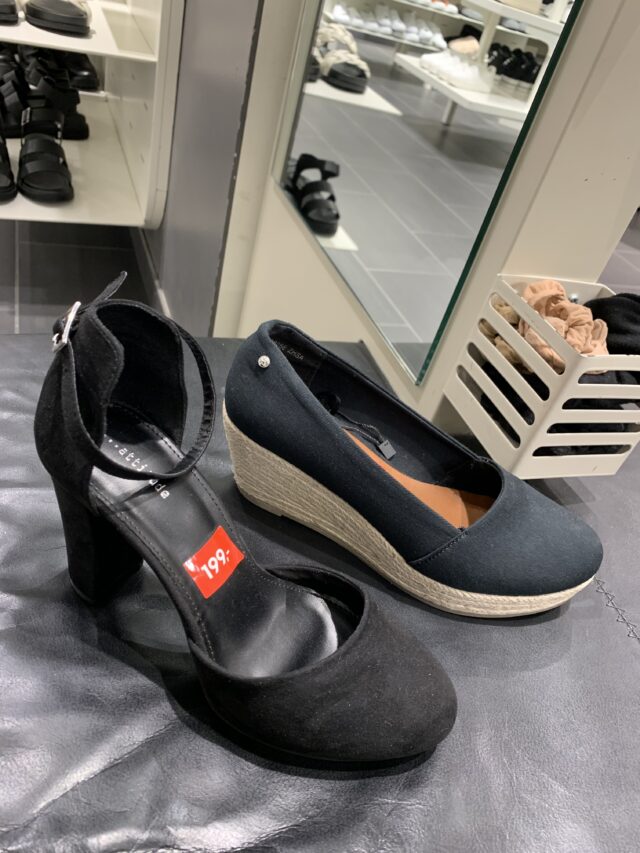 Black Womens Shoes In Shoe Store With Price Tags