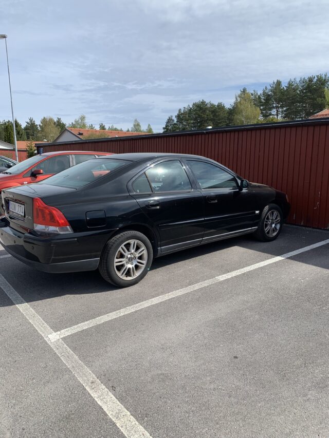 Black Volve S60 Parked on Parking Lot