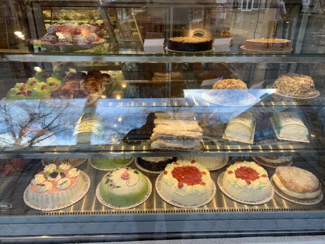 Whipped cream Cakes And Pastries In Bakery Window