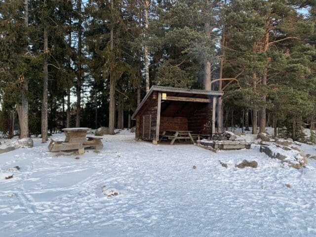 Campsite In The Wilderness With A Fireplace In Winter