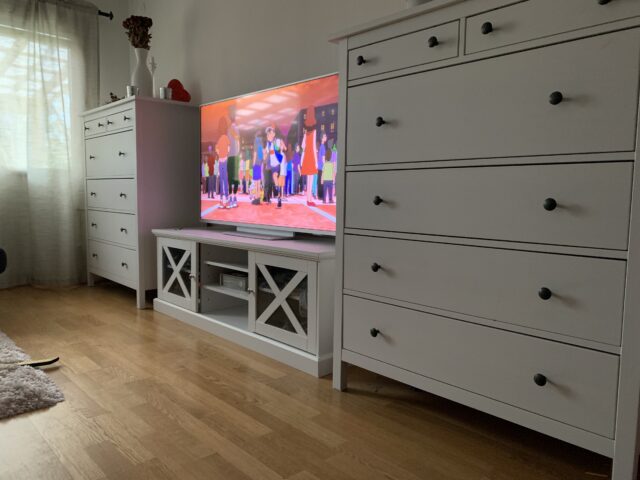 Living Room With Cartoons On A Tv By Drawers