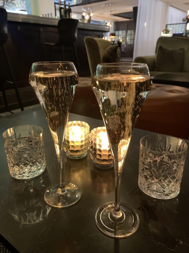 Two Glasses Of Champagne In A Hotel Bar