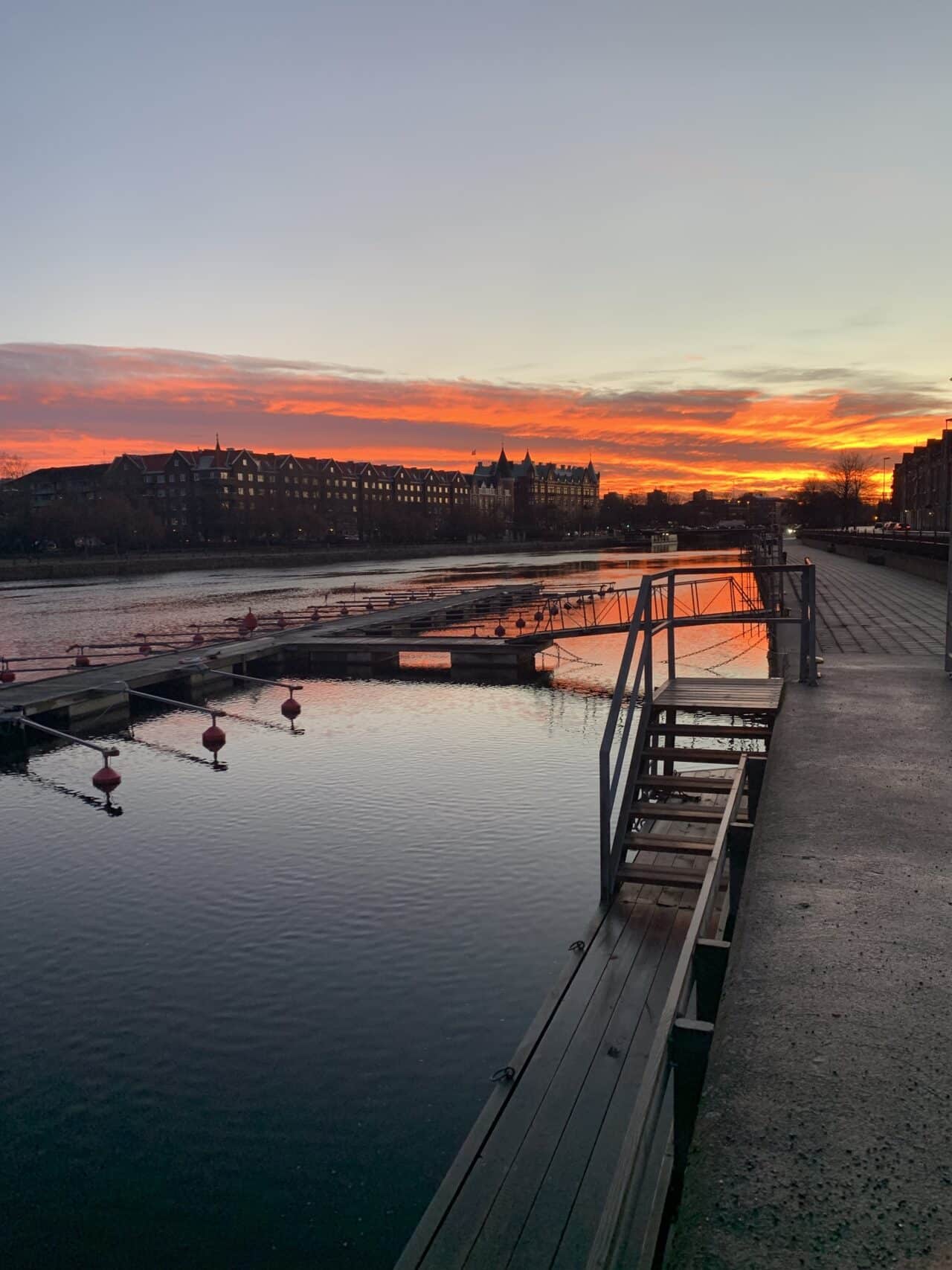 Orange Sunset By City River Dock