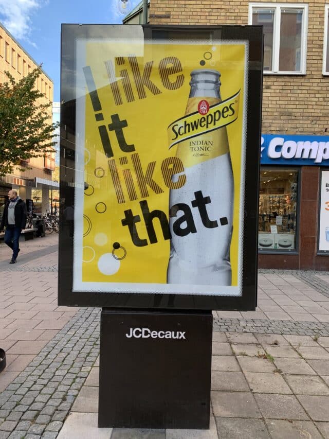 City Street Billboard Advertisement For Schweppes
