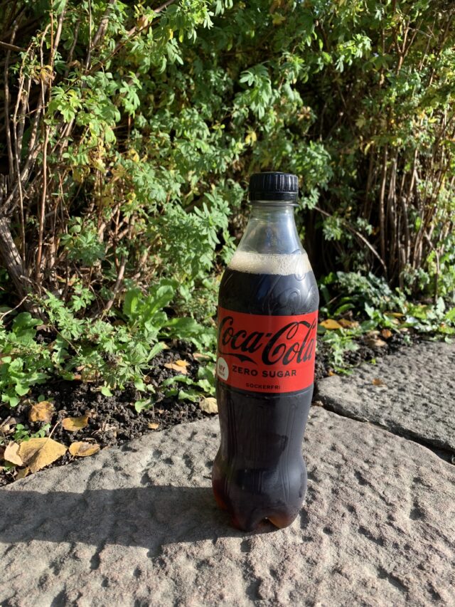 Coca Cola Zero Bottle On Stone Wall
