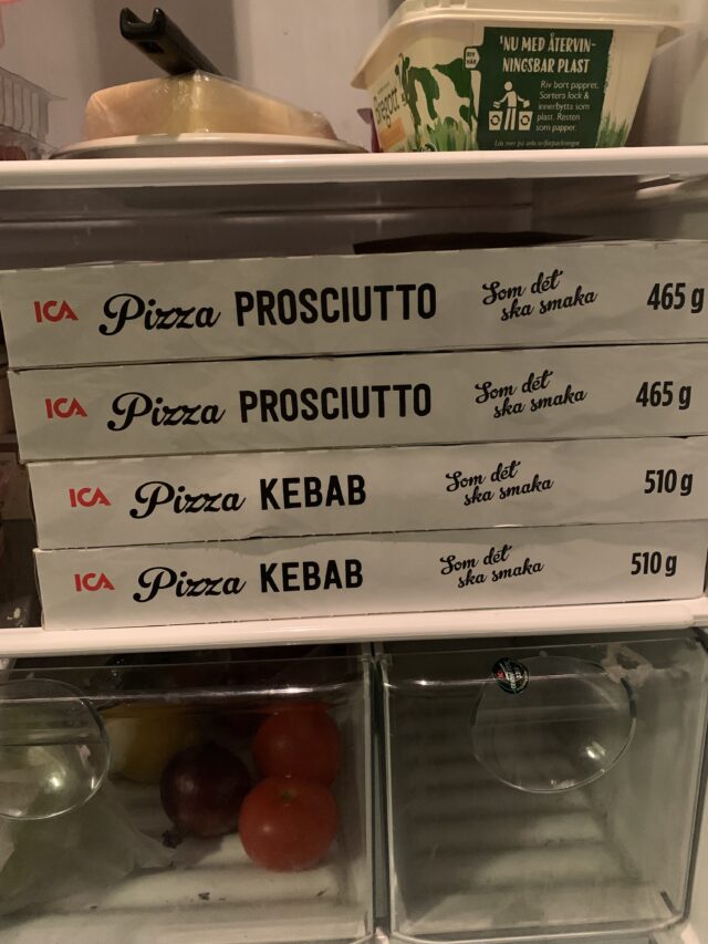 Prosciutto Pizza Cartons In Fridge With Butter And Vegetable Drawers