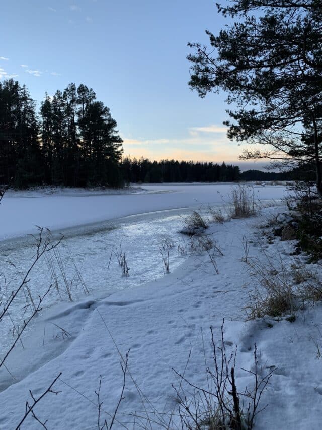 Snow Covered Frozen Lake In Winter