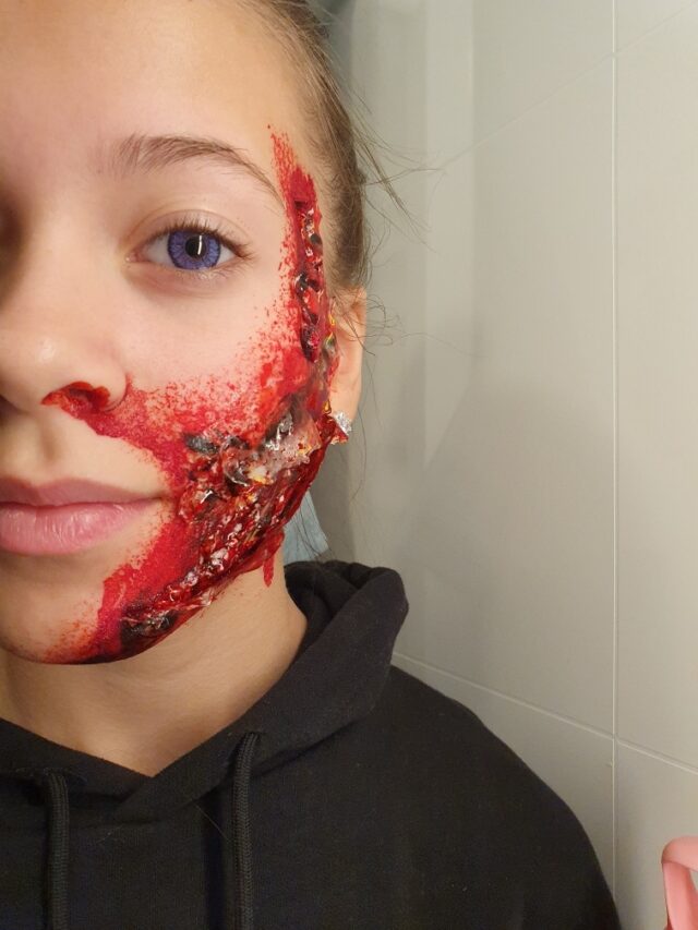 Girl Wearing Halloween Slash Injury Makeup