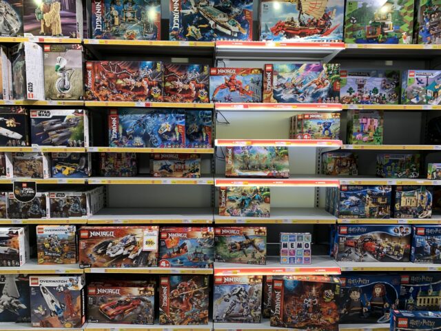 Lego Set Boxes On Shelves With Prices In A Toy Store