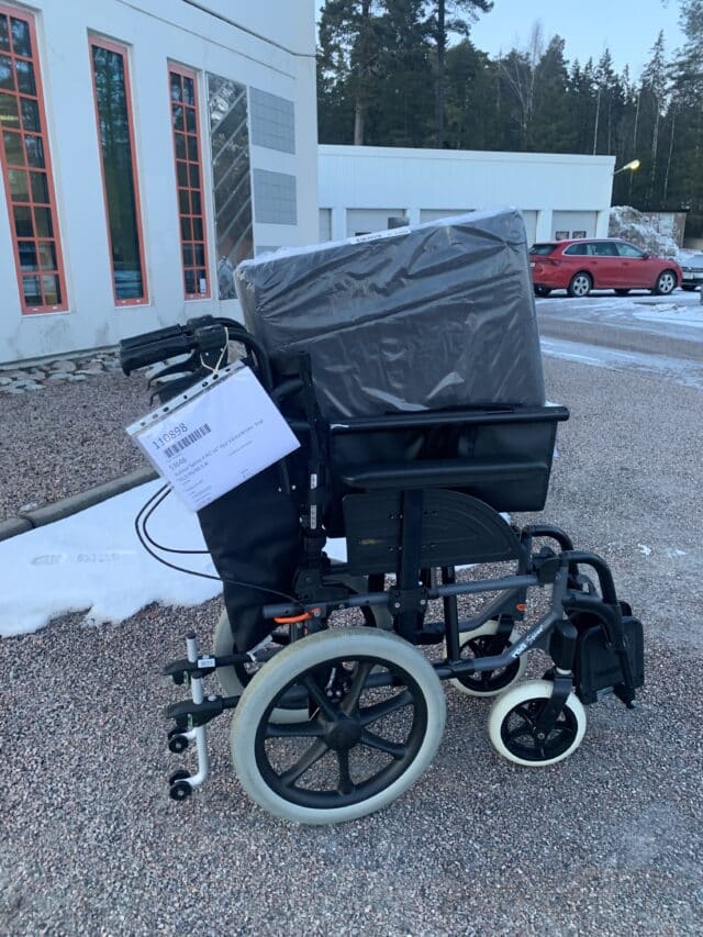 New Black Foldable Wheelchair With Pillow In Plastic Wrap