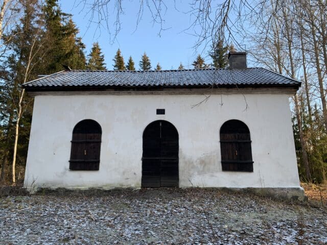Old Ancient White Church Building With Wooden Door