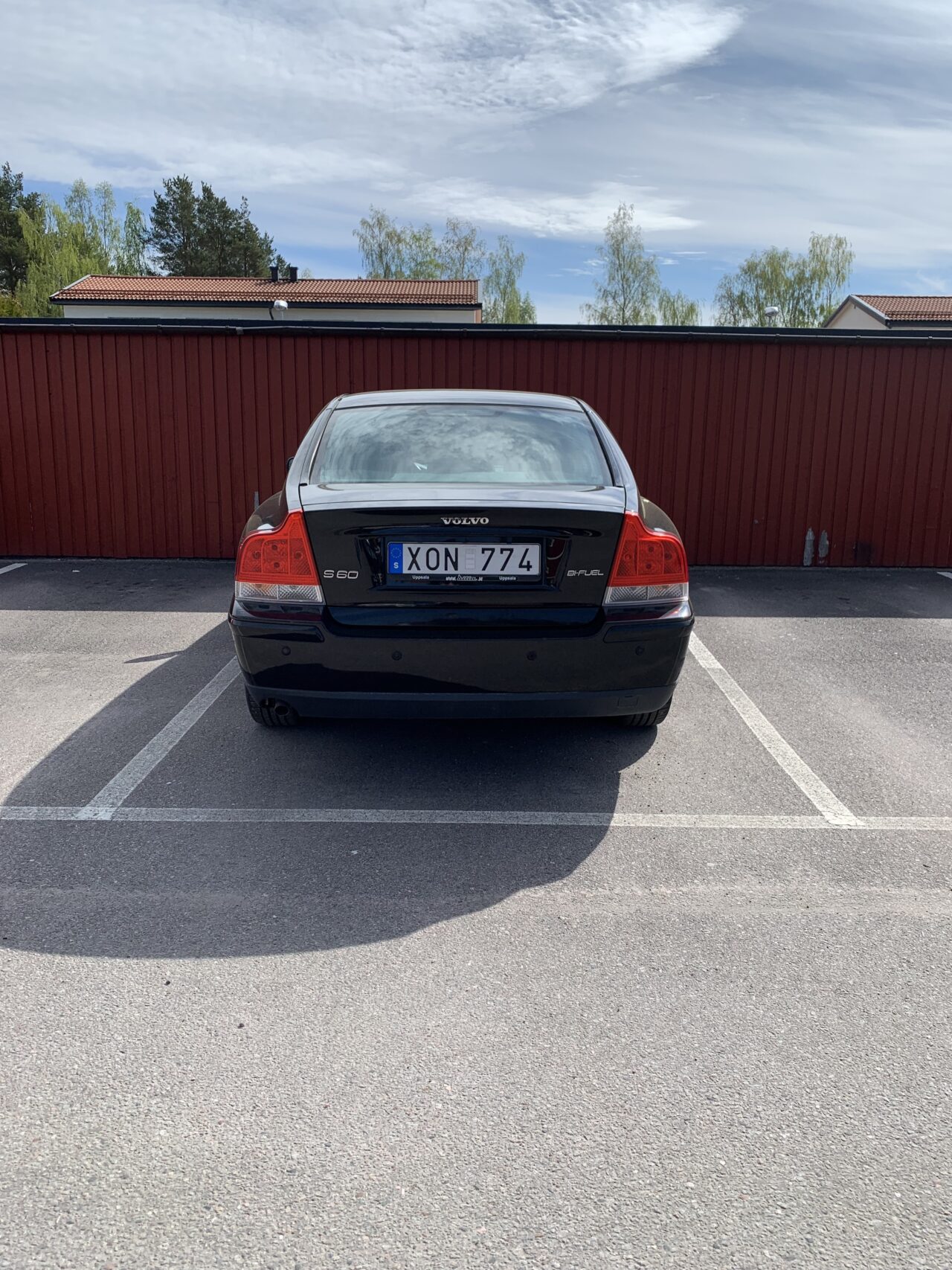 Parked Black Volvo S60 On Parking Lot