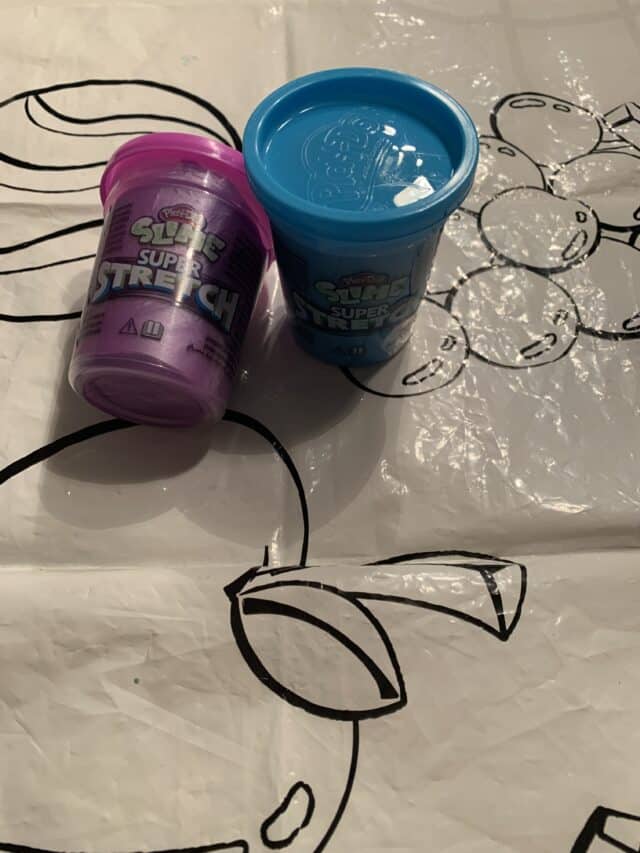 Play-Doh Jars On A Plastic Cover