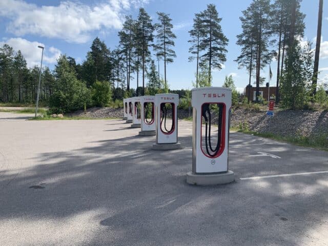 Tesla Supercharging Station With Charger Stalls