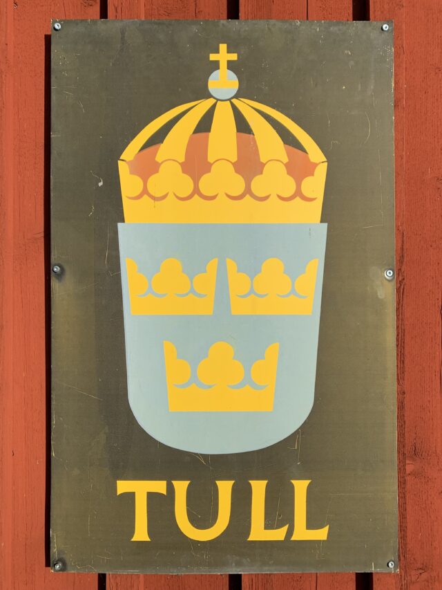 Swedish Police Toll Customs Sign On Red House Wall